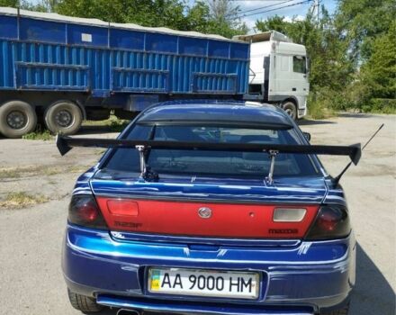 Синий Мазда 323, объемом двигателя 1 л и пробегом 200 тыс. км за 2150 $, фото 1 на Automoto.ua