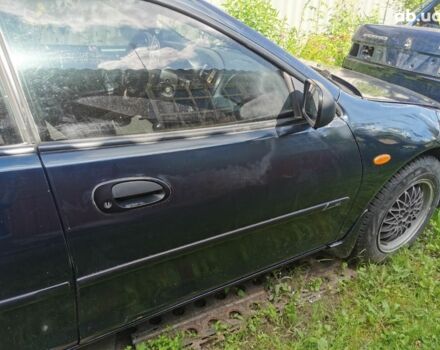Синий Мазда 323, объемом двигателя 1.5 л и пробегом 300 тыс. км за 2850 $, фото 6 на Automoto.ua