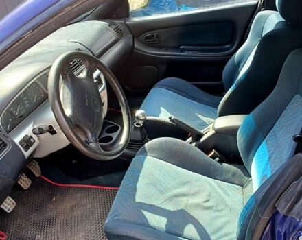 Синий Мазда 323, объемом двигателя 1.5 л и пробегом 300 тыс. км за 2500 $, фото 3 на Automoto.ua