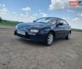Синий Мазда 323, объемом двигателя 1.5 л и пробегом 370 тыс. км за 1500 $, фото 1 на Automoto.ua