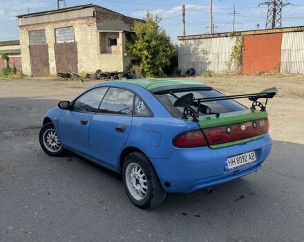 Синий Мазда 323, объемом двигателя 1.5 л и пробегом 100 тыс. км за 1500 $, фото 2 на Automoto.ua