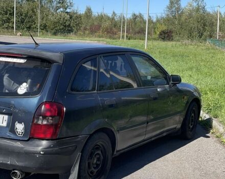 Синий Мазда 323, объемом двигателя 2 л и пробегом 240 тыс. км за 2500 $, фото 1 на Automoto.ua