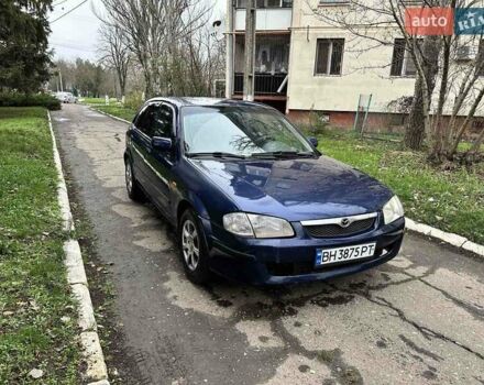 Синий Мазда 323, объемом двигателя 1.5 л и пробегом 315 тыс. км за 2400 $, фото 2 на Automoto.ua