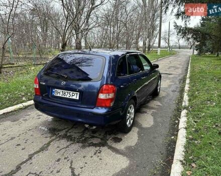 Синий Мазда 323, объемом двигателя 1.5 л и пробегом 315 тыс. км за 2400 $, фото 3 на Automoto.ua