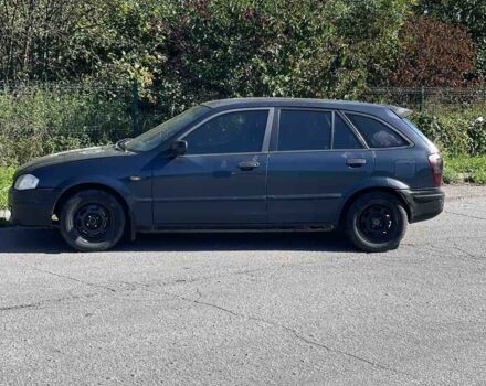 Синий Мазда 323, объемом двигателя 2 л и пробегом 240 тыс. км за 2500 $, фото 2 на Automoto.ua
