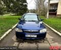 Синий Мазда 323, объемом двигателя 1.5 л и пробегом 315 тыс. км за 2400 $, фото 1 на Automoto.ua