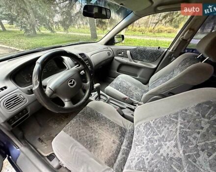 Синий Мазда 323, объемом двигателя 1.5 л и пробегом 315 тыс. км за 2400 $, фото 8 на Automoto.ua