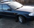 Синій Мазда 323, об'ємом двигуна 1.3 л та пробігом 270 тис. км за 1700 $, фото 1 на Automoto.ua
