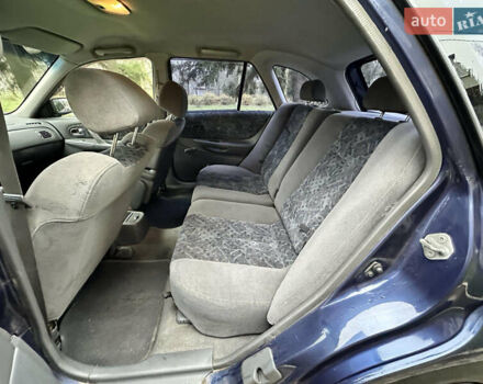 Синий Мазда 323, объемом двигателя 1.5 л и пробегом 315 тыс. км за 2400 $, фото 9 на Automoto.ua