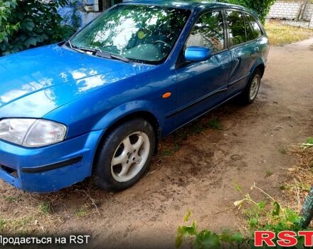 Синій Мазда 323, об'ємом двигуна 1.5 л та пробігом 300 тис. км за 550 $, фото 1 на Automoto.ua