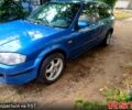 Синій Мазда 323, об'ємом двигуна 1.5 л та пробігом 300 тис. км за 550 $, фото 1 на Automoto.ua