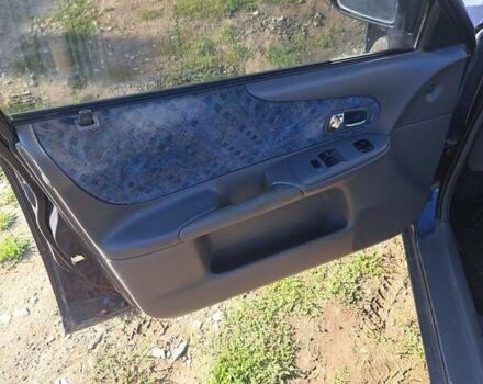 Синій Мазда 323, об'ємом двигуна 1.6 л та пробігом 223 тис. км за 1100 $, фото 3 на Automoto.ua
