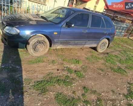 Синій Мазда 323, об'ємом двигуна 1.6 л та пробігом 223 тис. км за 1100 $, фото 1 на Automoto.ua