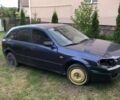 Синій Мазда 323, об'ємом двигуна 1.5 л та пробігом 220 тис. км за 2000 $, фото 2 на Automoto.ua