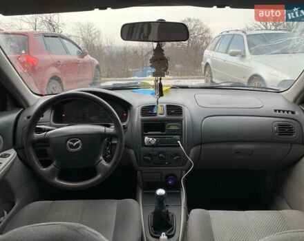 Синій Мазда 323, об'ємом двигуна 1.6 л та пробігом 200 тис. км за 2850 $, фото 6 на Automoto.ua