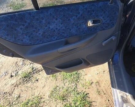 Синій Мазда 323, об'ємом двигуна 1.6 л та пробігом 223 тис. км за 1100 $, фото 4 на Automoto.ua