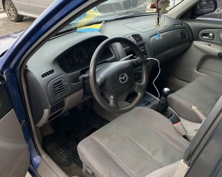 Синій Мазда 323, об'ємом двигуна 1.6 л та пробігом 200 тис. км за 2850 $, фото 8 на Automoto.ua