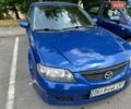 Синий Мазда 323, объемом двигателя 1.6 л и пробегом 176 тыс. км за 2900 $, фото 1 на Automoto.ua