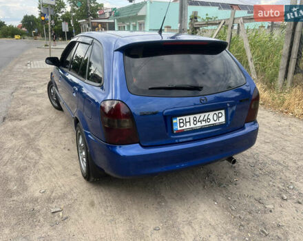 Синий Мазда 323, объемом двигателя 1.6 л и пробегом 172 тыс. км за 3600 $, фото 2 на Automoto.ua