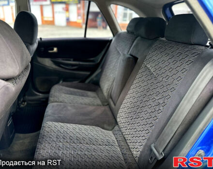 Синій Мазда 323, об'ємом двигуна 2 л та пробігом 300 тис. км за 3000 $, фото 9 на Automoto.ua