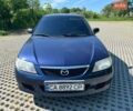 Синий Мазда 323, объемом двигателя 2 л и пробегом 288 тыс. км за 2500 $, фото 2 на Automoto.ua