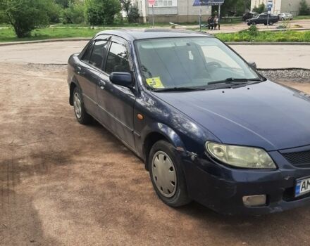 Синий Мазда 323, объемом двигателя 1 л и пробегом 360 тыс. км за 1200 $, фото 3 на Automoto.ua