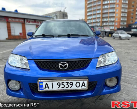 Синій Мазда 323, об'ємом двигуна 2 л та пробігом 300 тис. км за 3000 $, фото 2 на Automoto.ua