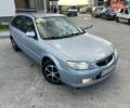 Синій Мазда 323, об'ємом двигуна 1.6 л та пробігом 250 тис. км за 2399 $, фото 1 на Automoto.ua