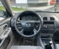 Синій Мазда 323, об'ємом двигуна 1.6 л та пробігом 250 тис. км за 2399 $, фото 42 на Automoto.ua