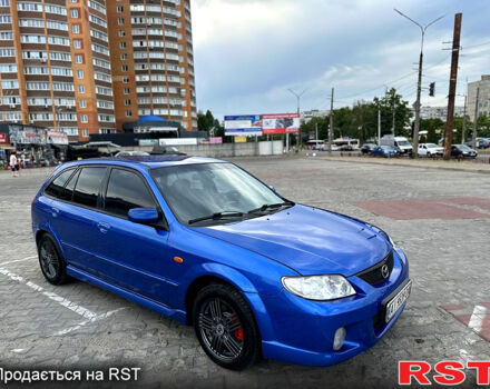 Синій Мазда 323, об'ємом двигуна 2 л та пробігом 300 тис. км за 3000 $, фото 1 на Automoto.ua