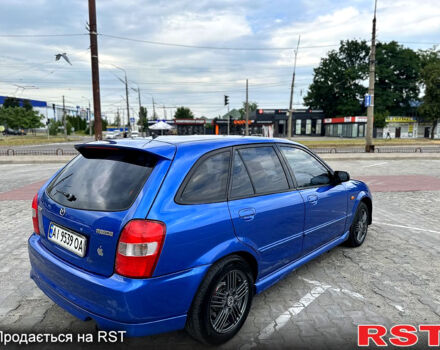 Синій Мазда 323, об'ємом двигуна 2 л та пробігом 300 тис. км за 3000 $, фото 5 на Automoto.ua