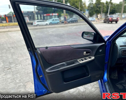 Синій Мазда 323, об'ємом двигуна 2 л та пробігом 300 тис. км за 3000 $, фото 8 на Automoto.ua