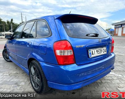 Синій Мазда 323, об'ємом двигуна 2 л та пробігом 300 тис. км за 3000 $, фото 4 на Automoto.ua