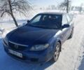 Синій Мазда 323, об'ємом двигуна 1.3 л та пробігом 250 тис. км за 1600 $, фото 3 на Automoto.ua