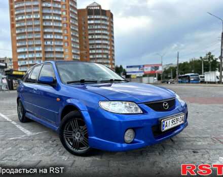 Синій Мазда 323, об'ємом двигуна 2 л та пробігом 300 тис. км за 3000 $, фото 3 на Automoto.ua