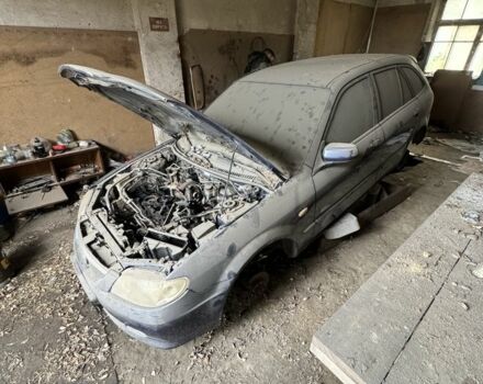 Синий Мазда 323, объемом двигателя 0 л и пробегом 200 тыс. км за 500 $, фото 2 на Automoto.ua