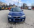 Синій Мазда 323, об'ємом двигуна 2 л та пробігом 259 тис. км за 1700 $, фото 1 на Automoto.ua