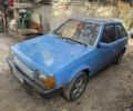 Синий Мазда 323, объемом двигателя 1.5 л и пробегом 253 тыс. км за 300 $, фото 1 на Automoto.ua