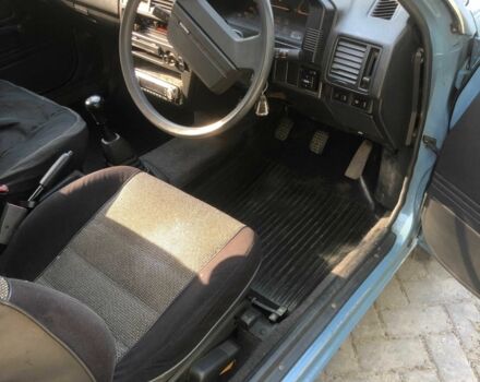 Синій Мазда 323, об'ємом двигуна 1.3 л та пробігом 140 тис. км за 1927 $, фото 7 на Automoto.ua