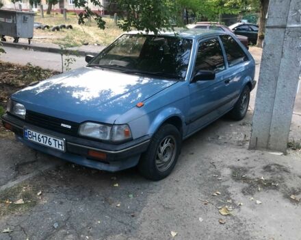 Синій Мазда 323, об'ємом двигуна 1.3 л та пробігом 140 тис. км за 1927 $, фото 1 на Automoto.ua