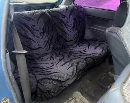 Синій Мазда 323, об'ємом двигуна 1.6 л та пробігом 320 тис. км за 400 $, фото 4 на Automoto.ua