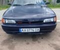 Синий Мазда 323, объемом двигателя 1.32 л и пробегом 259 тыс. км за 700 $, фото 1 на Automoto.ua