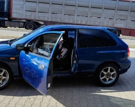 Синій Мазда 323, об'ємом двигуна 1.3 л та пробігом 278 тис. км за 1499 $, фото 1 на Automoto.ua