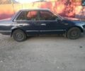 Синий Мазда 323, объемом двигателя 1.72 л и пробегом 300 тыс. км за 800 $, фото 1 на Automoto.ua