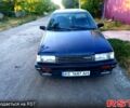 Синий Мазда 323, объемом двигателя 1.7 л и пробегом 320 тыс. км за 800 $, фото 1 на Automoto.ua