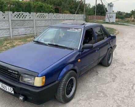 Синій Мазда 323, об'ємом двигуна 1.5 л та пробігом 300 тис. км за 1350 $, фото 2 на Automoto.ua