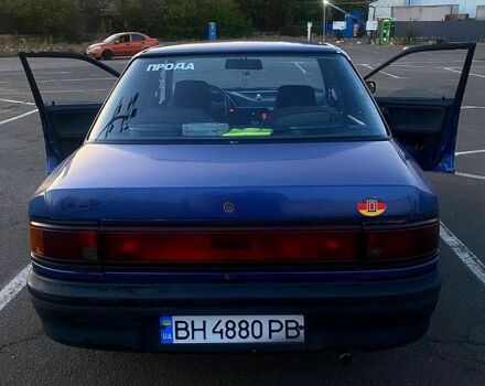 Синій Мазда 323, об'ємом двигуна 1.3 л та пробігом 0 тис. км за 1200 $, фото 4 на Automoto.ua