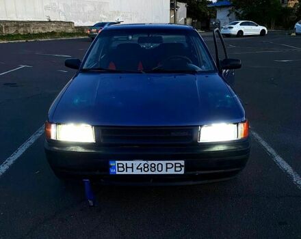 Синій Мазда 323, об'ємом двигуна 1.3 л та пробігом 0 тис. км за 1200 $, фото 1 на Automoto.ua