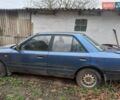 Синий Мазда 323, объемом двигателя 1.3 л и пробегом 240 тыс. км за 350 $, фото 1 на Automoto.ua