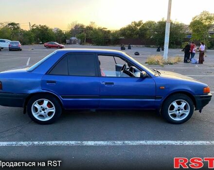 Синій Мазда 323, об'ємом двигуна 1.3 л та пробігом 0 тис. км за 1200 $, фото 6 на Automoto.ua